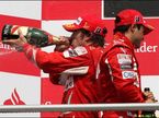 Гонщики Ferrari на подиуме Гран При Германии