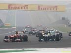 Борьба Нико Росберга и Фелипе Массы на старте Гран При Индии