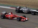 Михаэль Шумахер и Кими Райкконен на Гран При Европы 2003 года