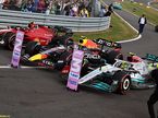 Машины Ferrari, Red Bull и Mercedes после финиша Гран При Великобритании