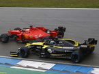 Машины Ferrari и Renault на трассе в Хоккенхайме