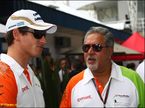 Адриан Сутил с руководителем Force India Виджеем Мальей
