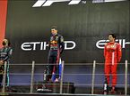 Подиум Гран При Абу-Даби 2021. Льюис Хэмилтон, Макс Ферстаппен и Карлос Сайнс