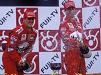 Михаэль Шумахер и Эдди Ирвайн на подиуме Гран При Японии, 1999 год