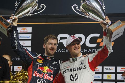 Себастьян Феттель и Михаэль Шумахер после победы в Кубке Наций на Гонке Чемпионом в Бангкоке, 2012 год